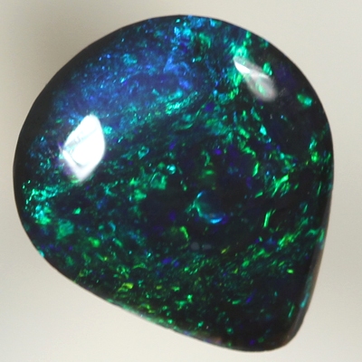 SOLID BLACK OPAL Bright bottle green fire